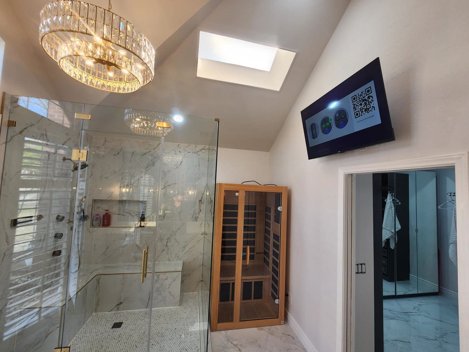 Modern farmhouse bathroom with chandelier and walk-in shower in Frisco, TX